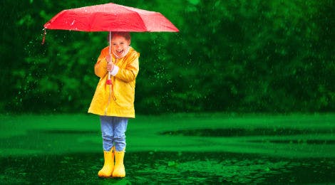 Kind met paraplu